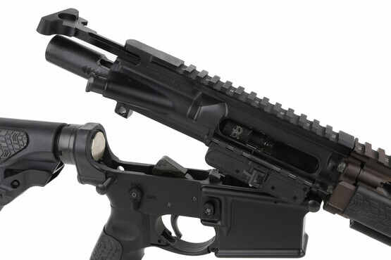 The Daniel Defense M4 5.56 AR rifle features a manganese phosphate coated bolt carrier group and standard charging handle